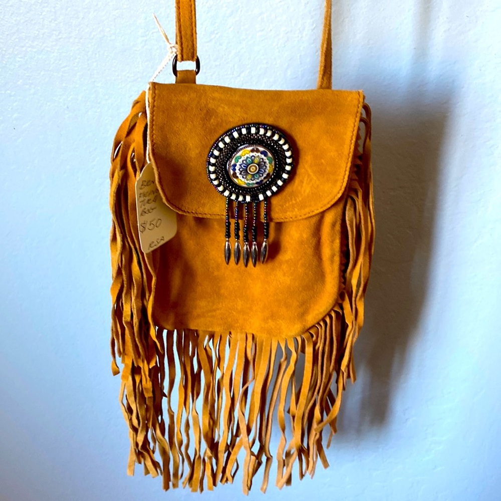 Tan fringe bag  with beaded detail and silver so cute